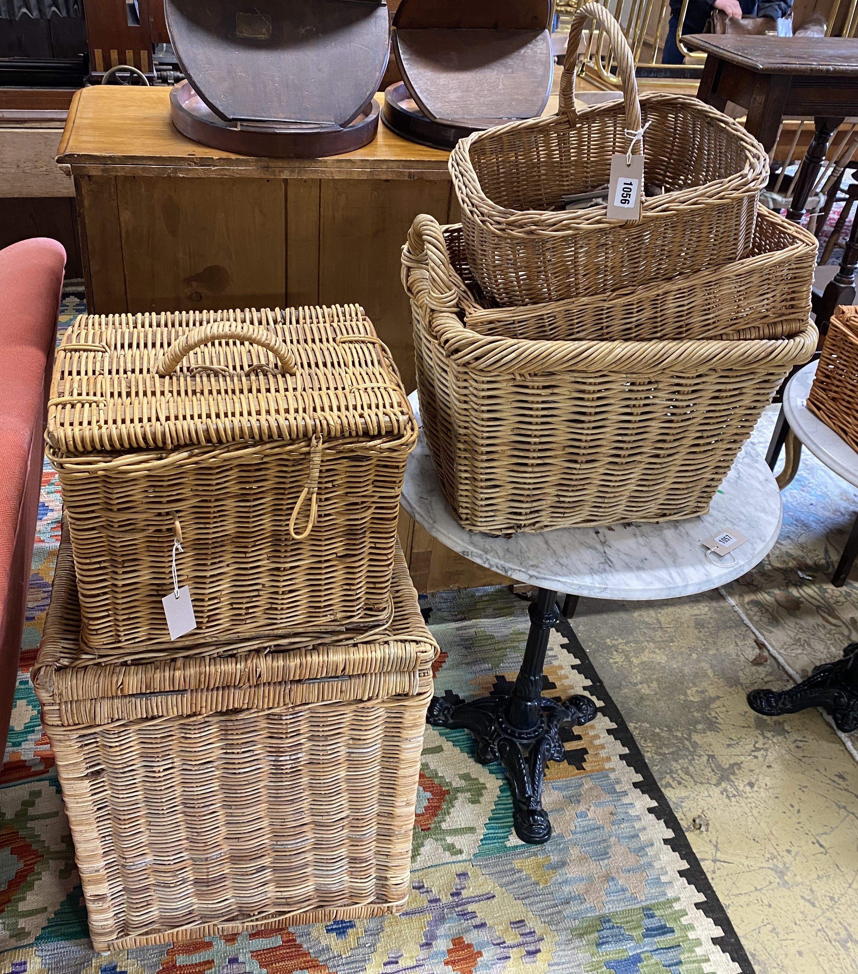 A quantity of wicker baskets, largest width 50cm, height 64cm
